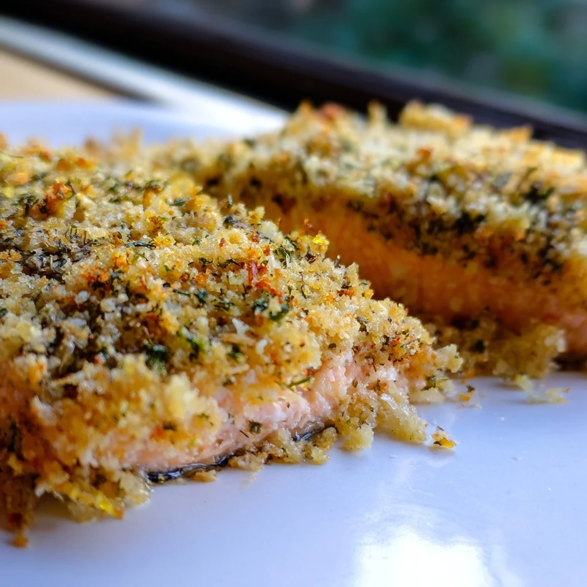 Serve Irresistibly Crispy Parmesan Salmon with fresh parsley garnish, perfect for an easy low-carb pescatarian dinner.