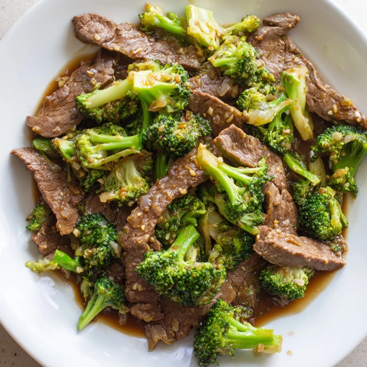 Savory Chinese-American beef and broccoli dish served over steamed white rice with dark glossy glaze