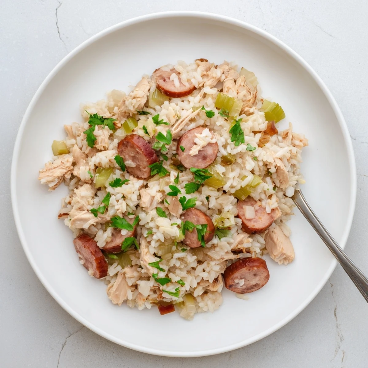 Golden Southern Chicken Bog served family-style with succulent chicken pieces, aromatic vegetables, and perfectly cooked white rice