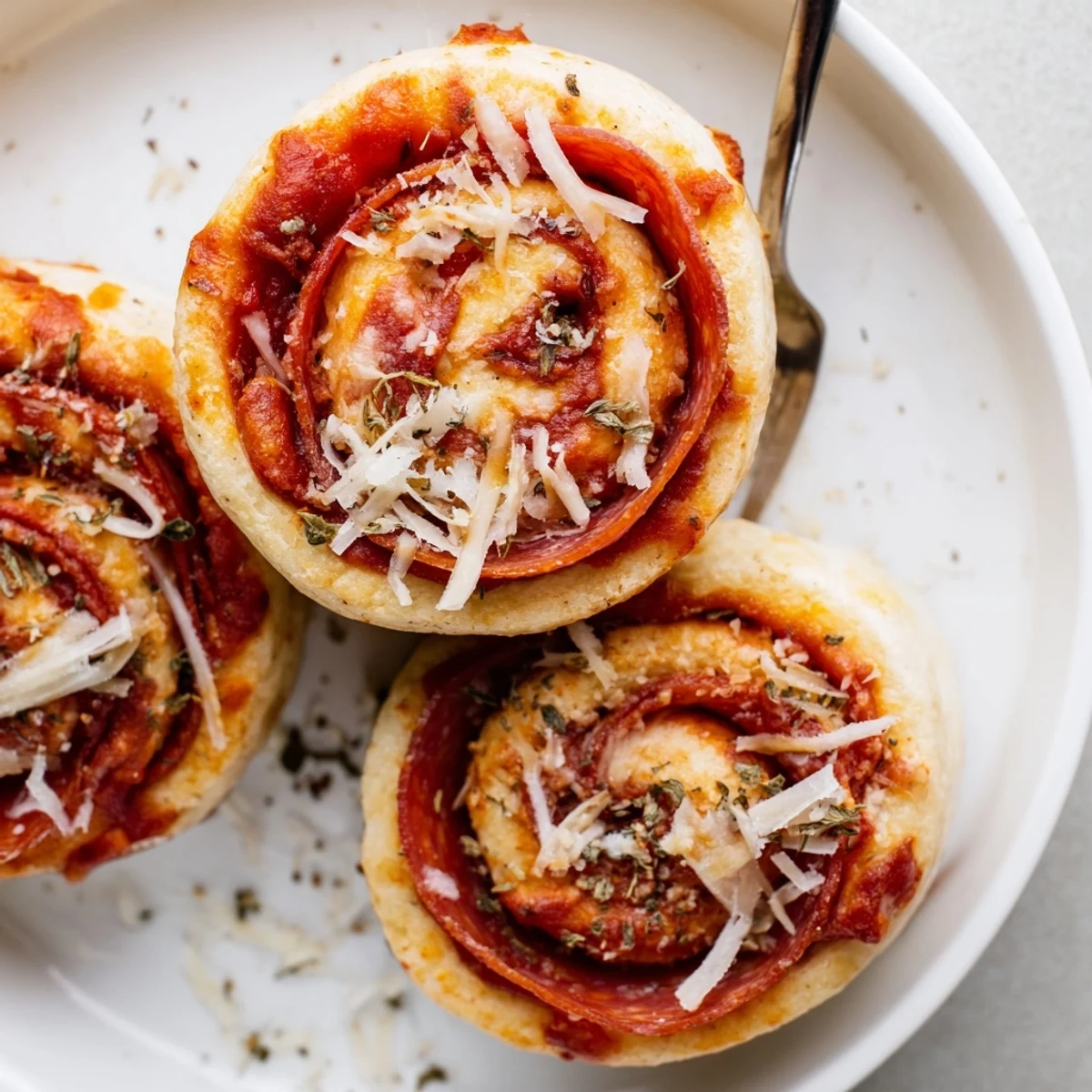 Party-ready Gluten Free Pizza Rolls Snack on parchment, crisp edges, melted mozzarella
